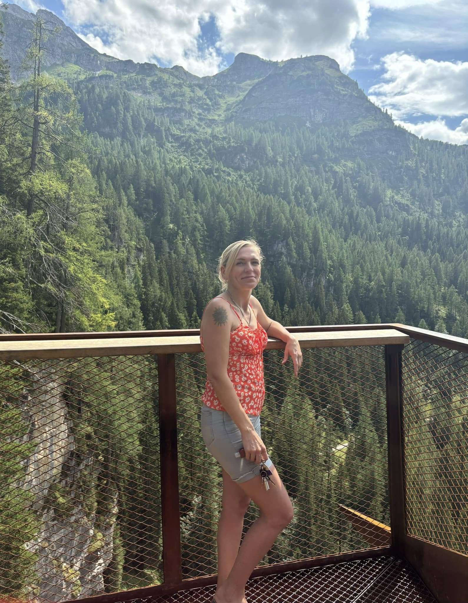 Maria at a waterfall — her journey back to faith